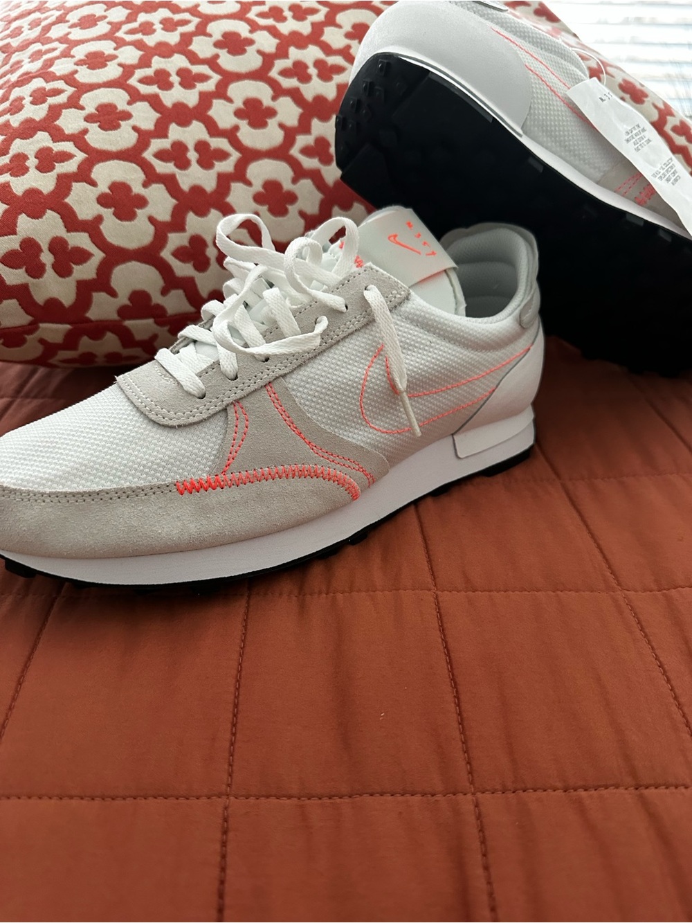 Nike Women’s White Sneakers with Coral Accents